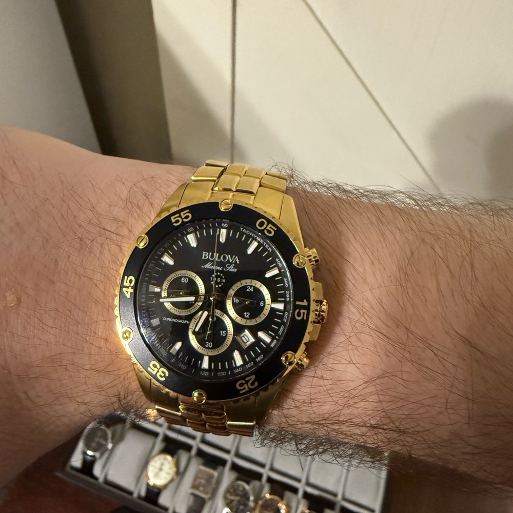 Bulova Gold Tone Watch with Black Dial
